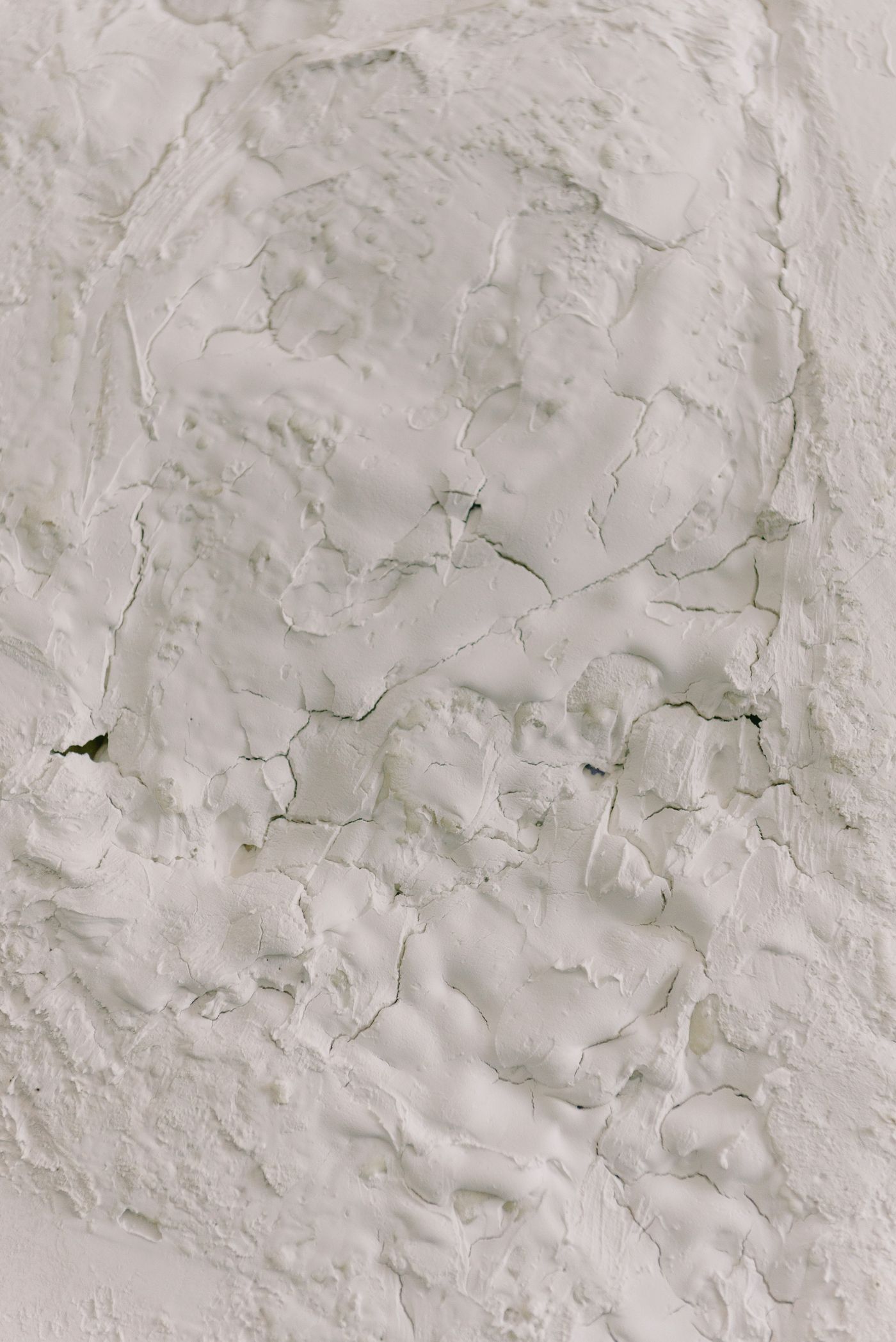 Close-up of raw plaster texture on a wall