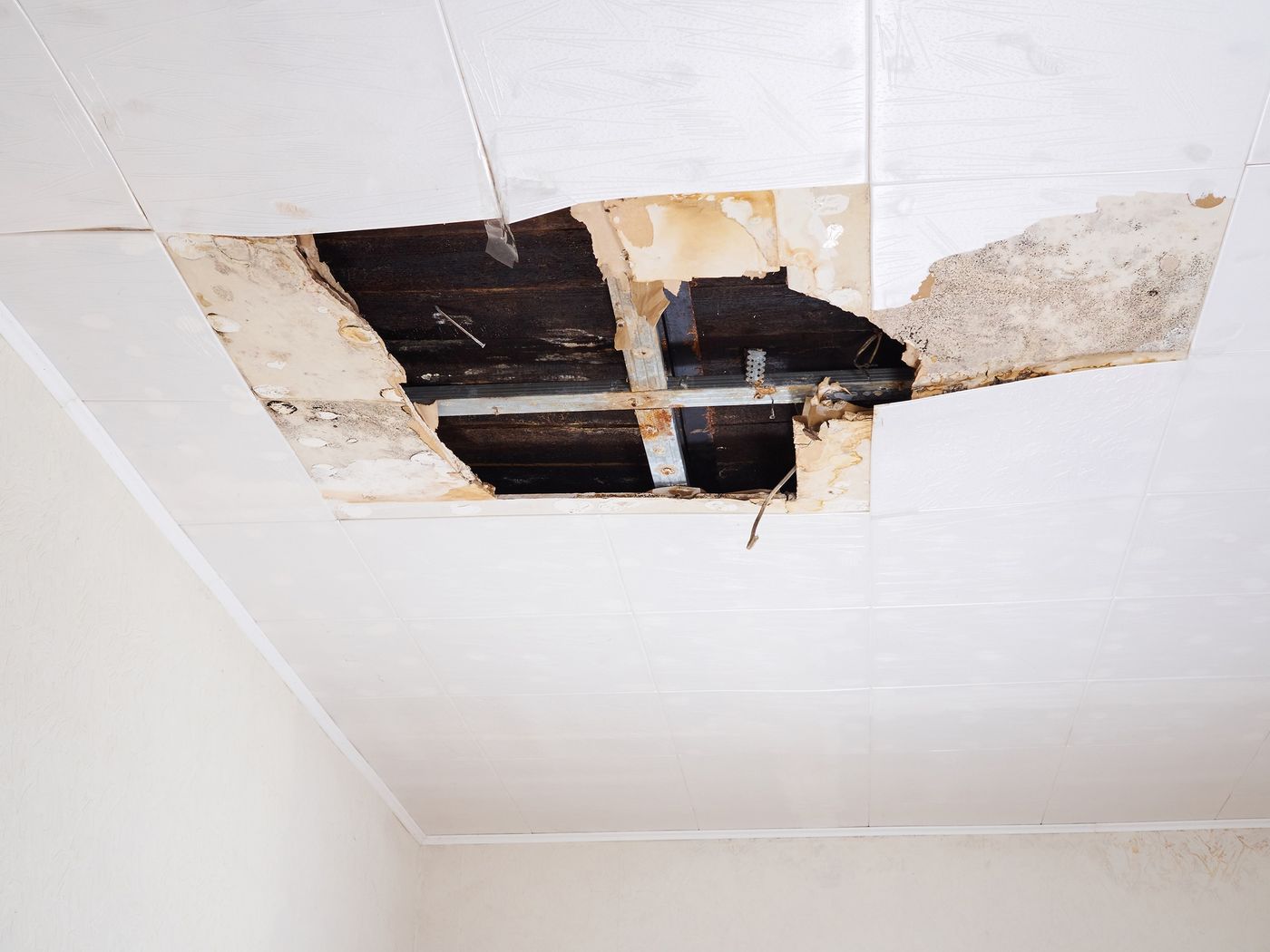 Ceiling panel opening prepared for patching