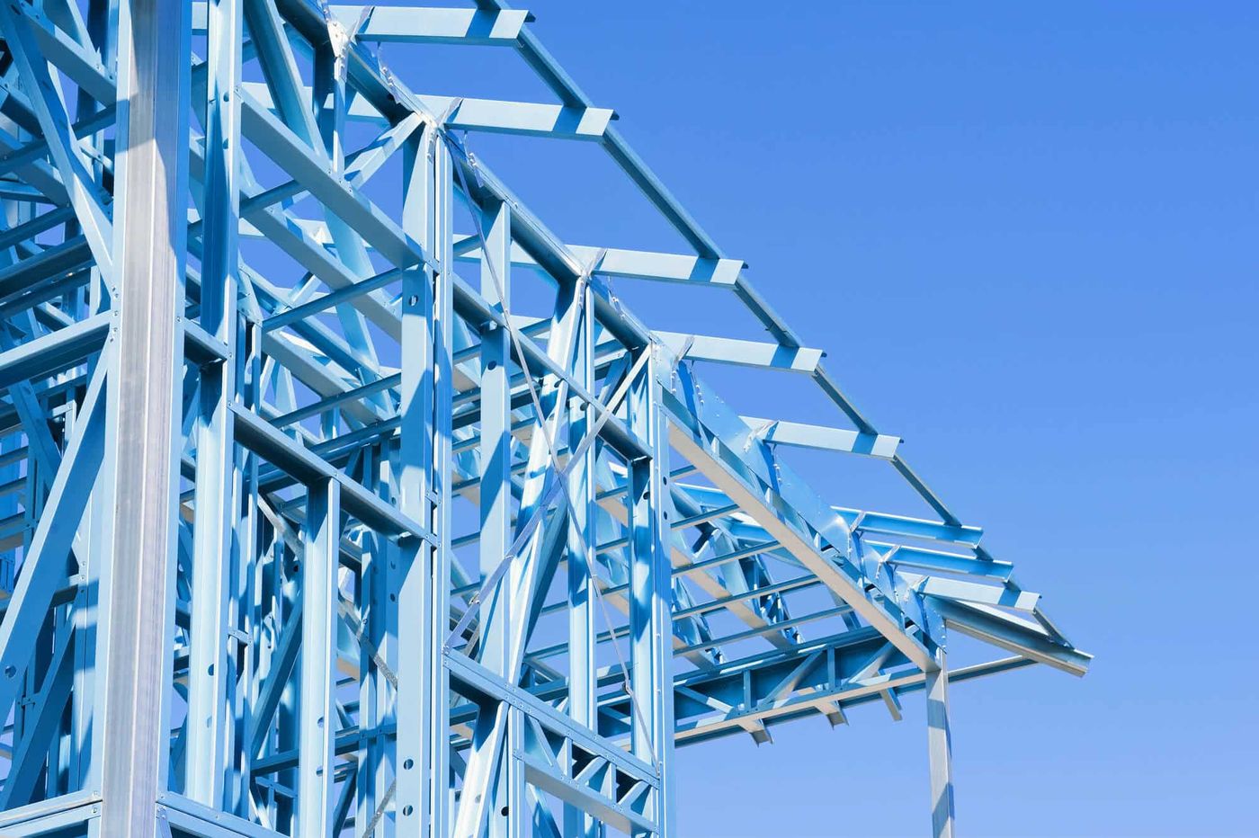 Steel stud framing against open sky on a commercial site