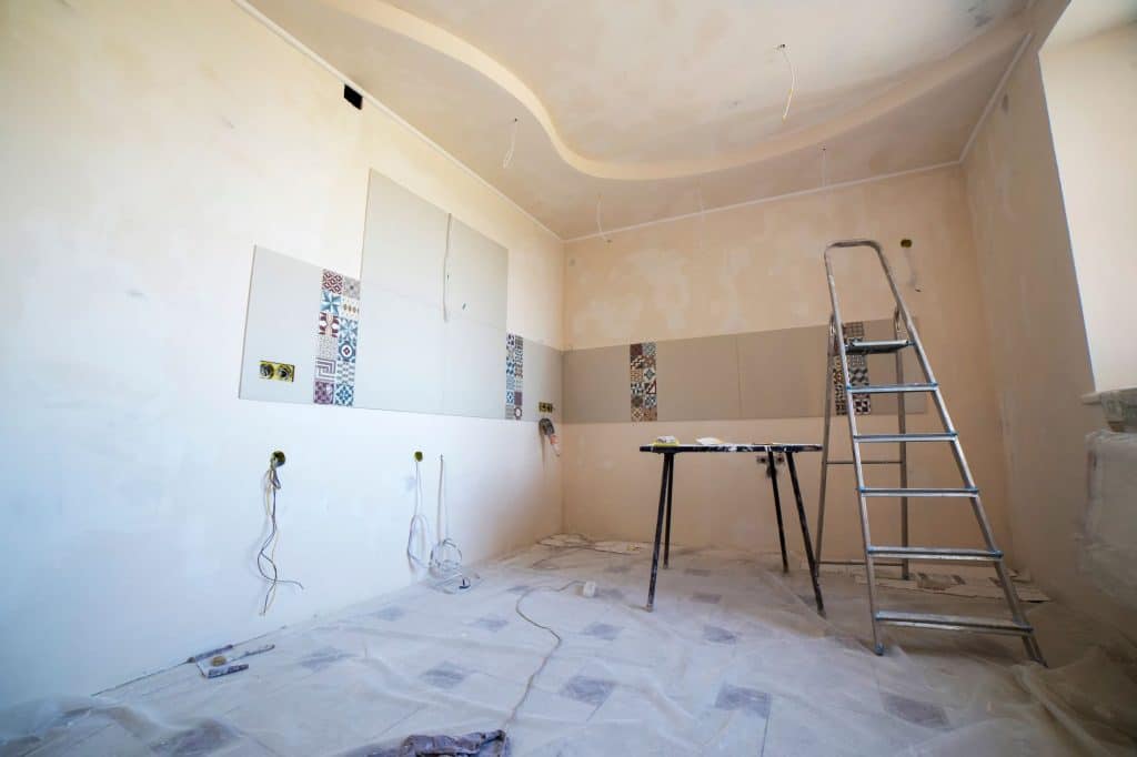 Hung drywall panels with taped joints before finish coats