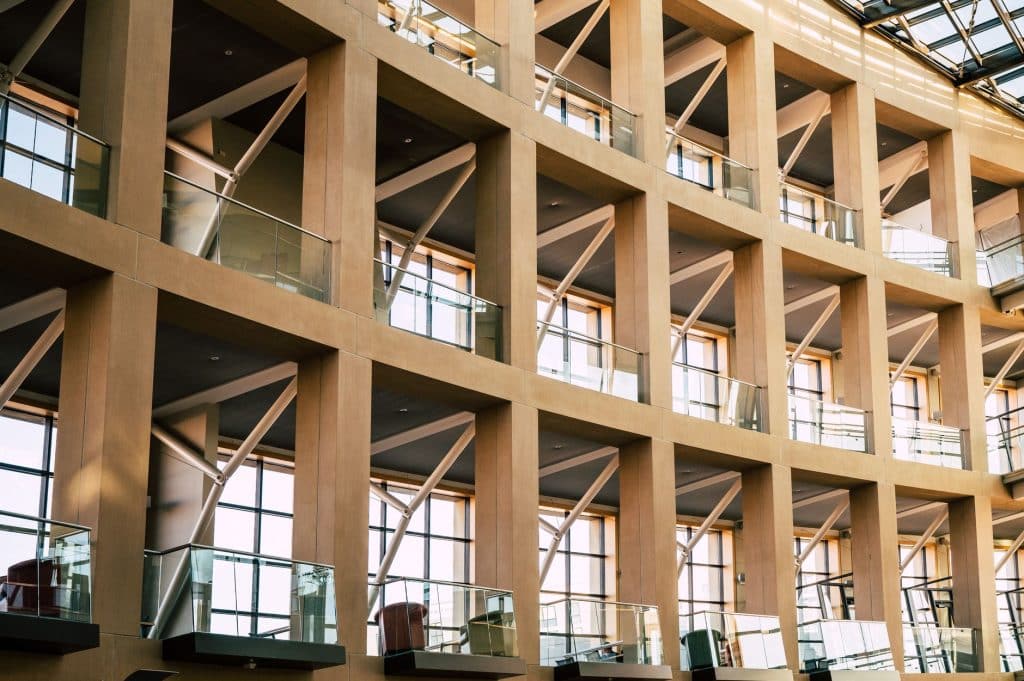 Modern commercial interior with steel framing and glass ceiling details
