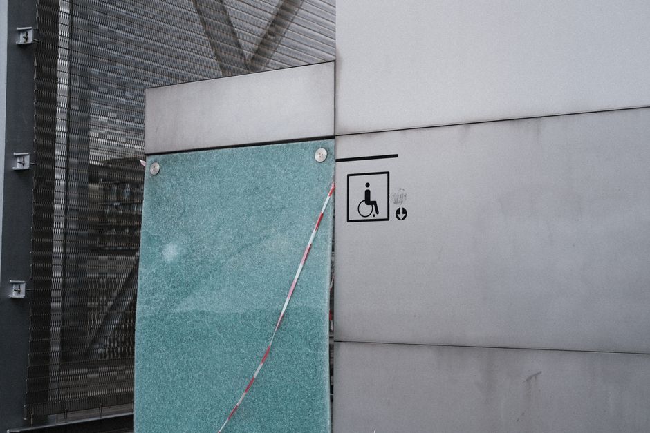 A finished interior wall or ceiling with a clean, paint-grade access panel installed flush with the surrounding drywall