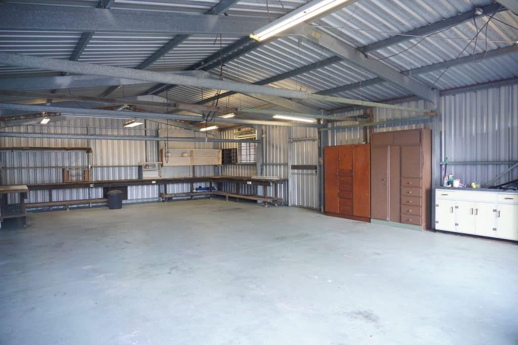 Attached garage with fire-rated drywall on the ceiling and shared wall
